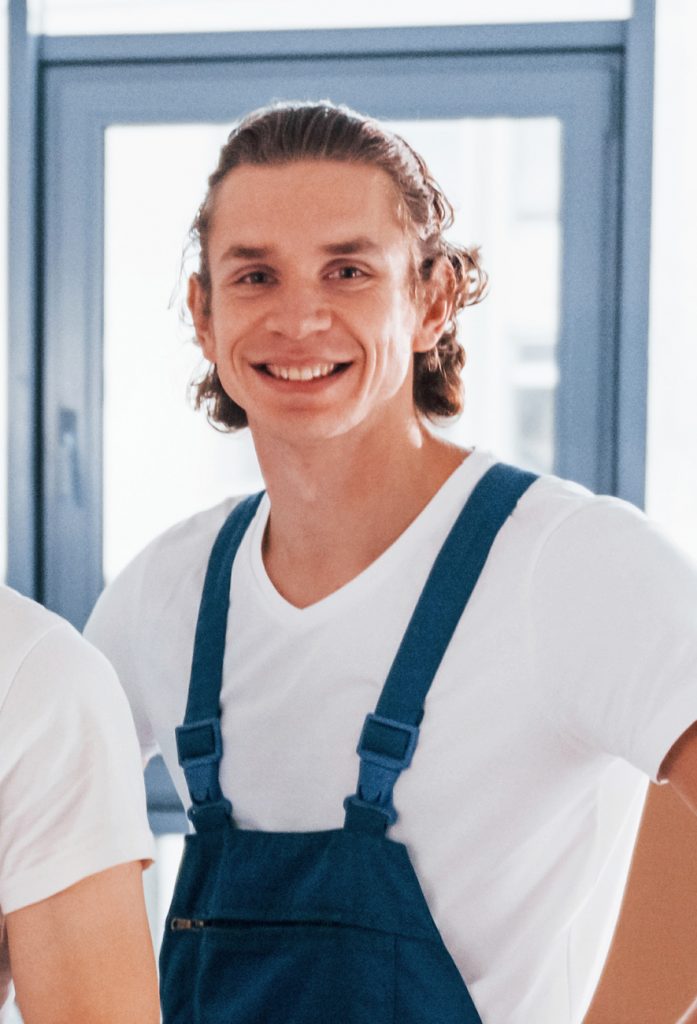 Worker smiling in camera